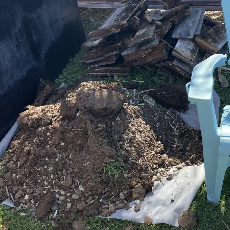 Pile of dirt and rock left over from a yard project